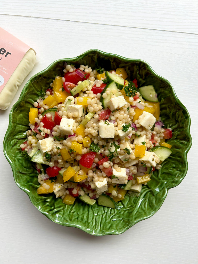 Couscous paneer, and veggie salad with lemon za'atar vinaigrette